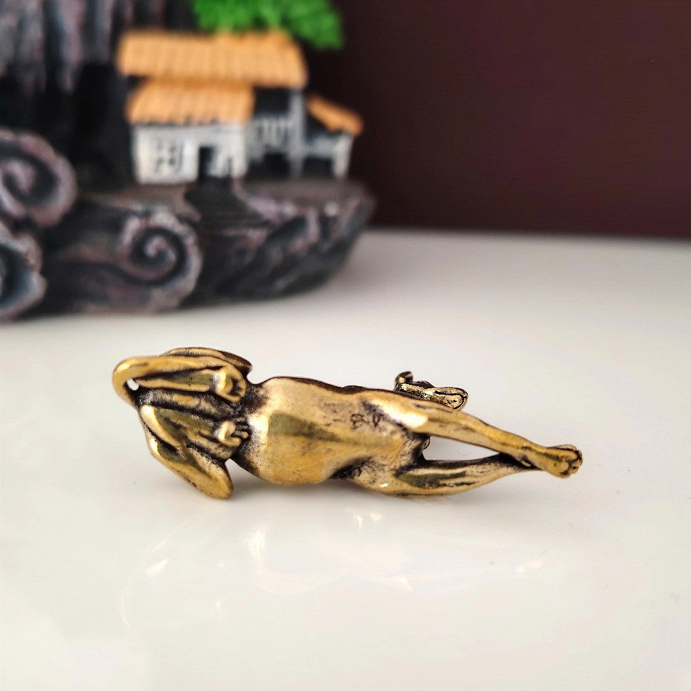 Resting Dog Figurine