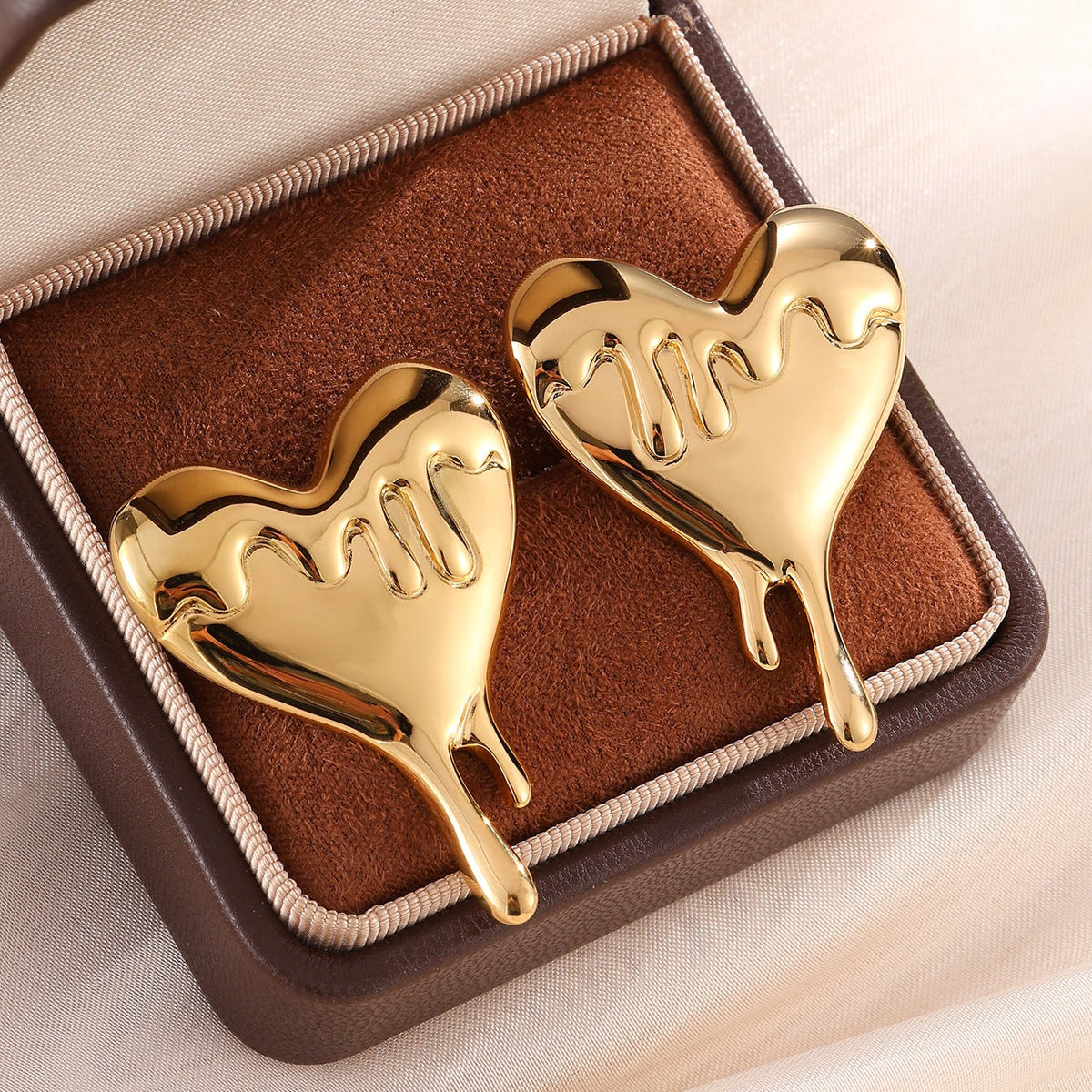 Melted Heart Statement Earrings