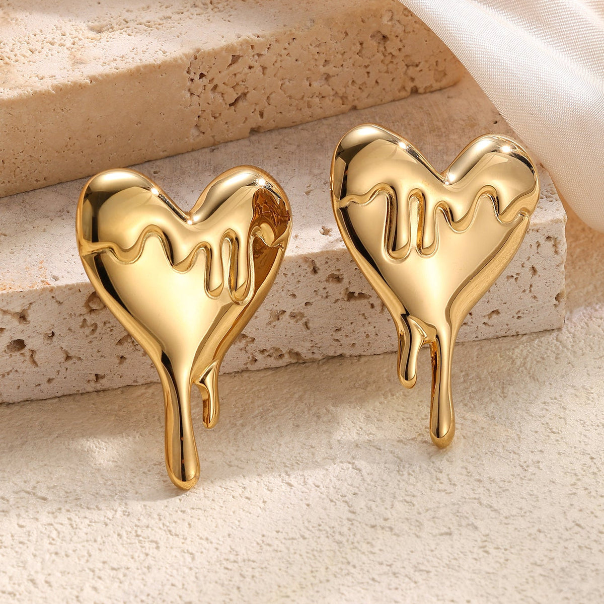 Melted Heart Statement Earrings
