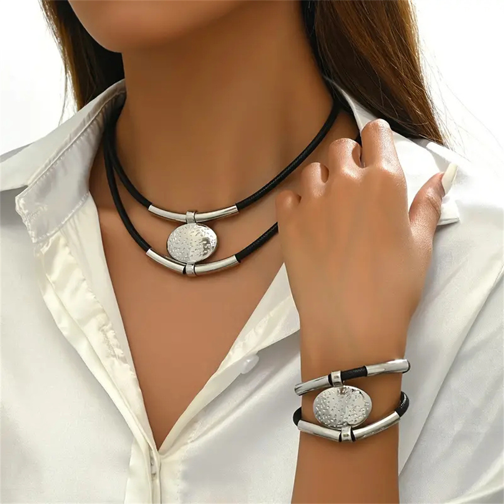 2pc Textured Gold Medallion Leather Set