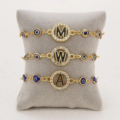 Evil Eye Initial Charm Bracelet