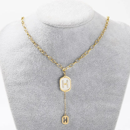 Crystal H Oval Pendant Necklace
