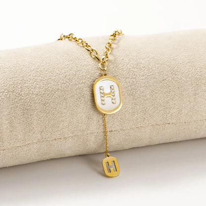 Crystal H Oval Pendant Necklace
