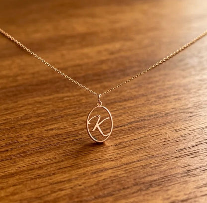 Oval Cursive Initial Necklace