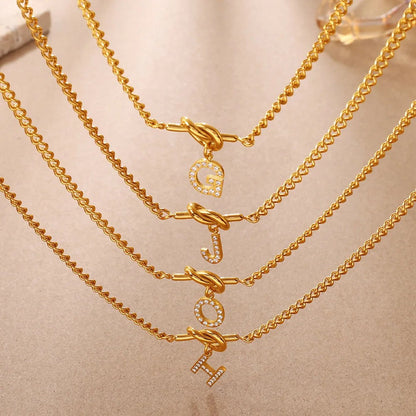 Zircon Initial Love Knot Necklace