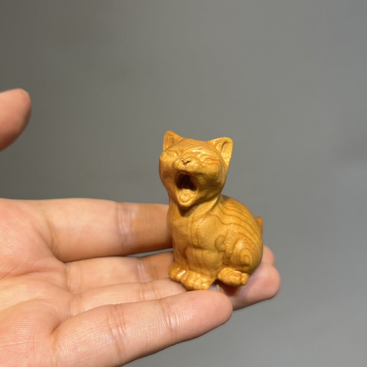 Carved Wood Yawning Cat Figurine